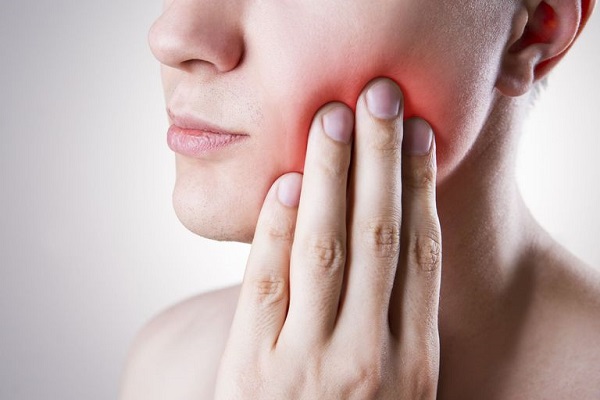 5 dấu hiệu mọc răng khôn 2