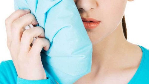 Mọc răng khôn phải làm sao khi bị đau nhức ê ẩm? 2